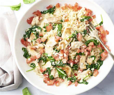Romige orzo met kipfilet en spinazie